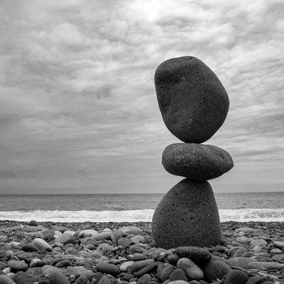 A smooth stone stack symbolizing balance and calm.